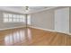 Spacious bedroom with hardwood floors, natural light, and a ceiling fan at 115 Old Postern Rd, Summerville, SC 29483