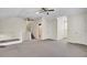 This expansive bonus room features neutral walls and carpet, and lots of closet space at 115 Old Postern Rd, Summerville, SC 29483