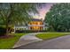 Charming two-story home with inviting porch and manicured lawn, perfect for Gathering living at 115 Old Postern Rd, Summerville, SC 29483