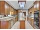Classic kitchen with ample cabinet space, stainless steel appliances, granite countertops, and an island at 115 Old Postern Rd, Summerville, SC 29483