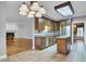 Classic kitchen featuring wood cabinets, stainless steel appliances, granite countertops, and tile flooring at 115 Old Postern Rd, Summerville, SC 29483