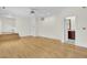 This spacious living room offers hardwood floors and an open floorplan with a bathroom access at 115 Old Postern Rd, Summerville, SC 29483