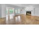 Bright living room with decorative windows and fireplace at 115 Old Postern Rd, Summerville, SC 29483