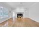 Living room featuring decorative windows and fireplace at 115 Old Postern Rd, Summerville, SC 29483