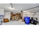 Bright garage with golf cart and ample storage shelves, offering a well-organized space at 1199 Parkway Drive, Mount Pleasant, SC 29464