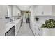 Stylish kitchen featuring sleek white cabinetry, marble countertops and stainless appliances at 1199 Parkway Drive, Mount Pleasant, SC 29464