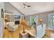 Bright and airy living room features vaulted ceilings, built-in bookshelves, and hardwood floors at 1199 Parkway Drive, Mount Pleasant, SC 29464
