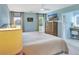 Comfortable bedroom featuring two windows, a ceiling fan, and soft blue paint at 1199 Parkway Drive, Mount Pleasant, SC 29464