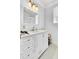 Bright bathroom with a vanity and a large mirror with shower reflected in the glass at 1237 Fort Dr, Hanahan, SC 29410
