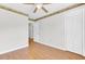 Bedroom featuring laminate floors and double door closets at 1237 Fort Dr, Hanahan, SC 29410
