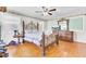 Comfortable bedroom with a ceiling fan and natural light from multiple windows at 1237 Fort Dr, Hanahan, SC 29410