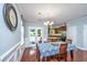 Open dining area with a view into the kitchen and backyard access at 1253 Dingle Rd, Mount Pleasant, SC 29466