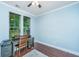 Office features a ceiling fan, a desk by the window, and dark hard wood floors at 1253 Dingle Rd, Mount Pleasant, SC 29466