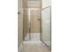 Bathroom showcasing walk-in shower with glass door, tiled walls and floors, and new fixtures at 1253 Dingle Rd, Mount Pleasant, SC 29466