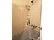 Small bathroom shower showing dated fixtures, shower caddy and tub at 126 Rattlensnake Trl, Walterboro, SC 29488