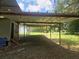 Spacious carport providing ample covered parking and storage space at 126 Rattlensnake Trl, Walterboro, SC 29488