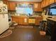Traditional kitchen with wood cabinets, complete with appliances and ample counter space at 126 Rattlensnake Trl, Walterboro, SC 29488