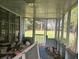Enclosed porch with ample space and natural light, perfect for relaxing at 126 Rattlensnake Trl, Walterboro, SC 29488