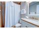 Bathroom boasts updated fixtures, a bright vanity, and shower with stylish tile at 1400 Ocean Blvd # 106B, Isle of Palms, SC 29451