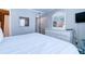 Bedroom with dresser, mirror, and flat-screen TV at 1400 Ocean Blvd # 106B, Isle of Palms, SC 29451