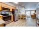 Cozy interior with modern kitchen, an eat in dining area and comfortable furniture in the inviting living room at 1400 Ocean Blvd # 106B, Isle of Palms, SC 29451