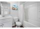 Bathroom features white cabinets and a shower-tub combination at 141 Sweet Cherry Ln, Summerville, SC 29486
