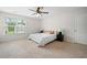 Bedroom featuring a ceiling fan, window, and two nightstands at 141 Sweet Cherry Ln, Summerville, SC 29486