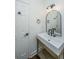 Stylish bathroom featuring a modern sink with sleek fixtures and a decorative mirror at 1520 Regimental Ln, Johns Island, SC 29455