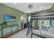 This bedroom has a bunk bed with a TV and a view at 1520 Regimental Ln, Johns Island, SC 29455