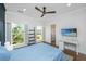 This bedroom has a TV and two windows at 1520 Regimental Ln, Johns Island, SC 29455