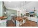 A stylish kitchen with a center island, stainless steel appliances, and open layout at 1520 Regimental Ln, Johns Island, SC 29455