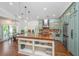 Spacious kitchen with island, custom cabinets, and stainless appliances at 1520 Regimental Ln, Johns Island, SC 29455