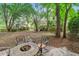 Cozy backyard with a fire pit and seating area, perfect for outdoor entertaining at 1664 William Hapton Way, Mount Pleasant, SC 29466