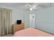Spare bedroom features neutral decor and attached TV on light wood dresser at 1664 William Hapton Way, Mount Pleasant, SC 29466