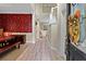 Open entryway featuring hardwood floors, natural light, and open access to the dining and living spaces at 1664 William Hapton Way, Mount Pleasant, SC 29466
