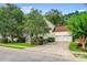Well-manicured lawn and landscaping complement this home with a two-car garage at 1664 William Hapton Way, Mount Pleasant, SC 29466