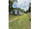 Charming one-story home with front yard and mature trees at 1912 English St, North Charleston, SC 29405