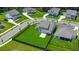 An aerial view of a beautiful home with a large, fenced backyard and lush landscaping at 1950 Parish House Cir, Johns Island, SC 29455