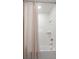 Clean bathroom featuring a bathtub, shower with white subway tile, and neutral accents at 1950 Parish House Cir, Johns Island, SC 29455