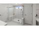 Bathroom showing glass enclosed shower with rainfall head, built in seat and toilet at 1950 Parish House Cir, Johns Island, SC 29455