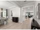 Spacious entryway with light wood floors, leading to the dining and living areas at 1950 Parish House Cir, Johns Island, SC 29455