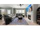 Comfortable living room featuring a fireplace, gray sectional sofa, and stylish decor at 1950 Parish House Cir, Johns Island, SC 29455
