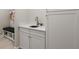 Convenient mudroom featuring a sink, storage cabinets, and a stylish organizer at 1950 Parish House Cir, Johns Island, SC 29455