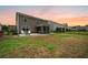 Backyard view with outdoor furniture, fire pit, and fenced-in yard at 199 Decatur Dr, Summerville, SC 29486