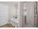 Bathroom with soaking tub, separate glass shower, and neutral color scheme at 199 Decatur Dr, Summerville, SC 29486