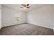 Neutral bedroom with ceiling fan, window, and plush carpeting at 199 Decatur Dr, Summerville, SC 29486