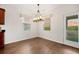 Cozy breakfast nook with natural light, stylish chandelier, and outdoor access at 199 Decatur Dr, Summerville, SC 29486