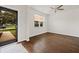 Inviting room with hardwood floors, a ceiling fan, and large window providing ample natural light at 199 Decatur Dr, Summerville, SC 29486