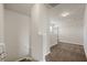 Bright hallway featuring neutral walls, recessed lighting, and brown carpet at 199 Decatur Dr, Summerville, SC 29486