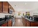 Modern kitchen equipped with stainless steel appliances, dark countertops, and ample cabinet space at 199 Decatur Dr, Summerville, SC 29486